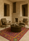 Rajvilas wool handtufted carpet with maroon, gold, and emerald floral design
